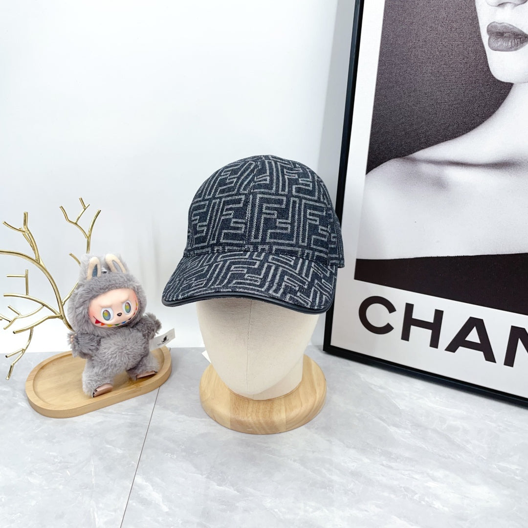 Fendi-style monogram baseball cap in dark navy with repeating FF pattern