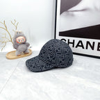 Fendi-style monogram baseball cap, back view, dark navy repeating pattern
