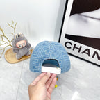 Fendi blue patterned baseball cap, underside view of curved brim.