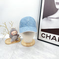 Fendi blue patterned baseball cap with curved brim and tonal F-style motif.