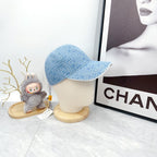 Fendi light blue patterned baseball cap with curved brim, angled front view.