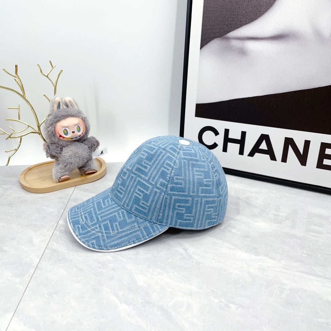 Fendi blue patterned baseball cap with curved brim, lying down showing front panel.