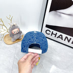 Blue baseball cap with allover F logo pattern, rear view with opening