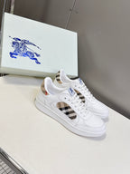 White low-top sneakers with blue horse logo and check-pattern side panel