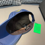 Prada blue baseball cap interior with black lining and adjustable strap.