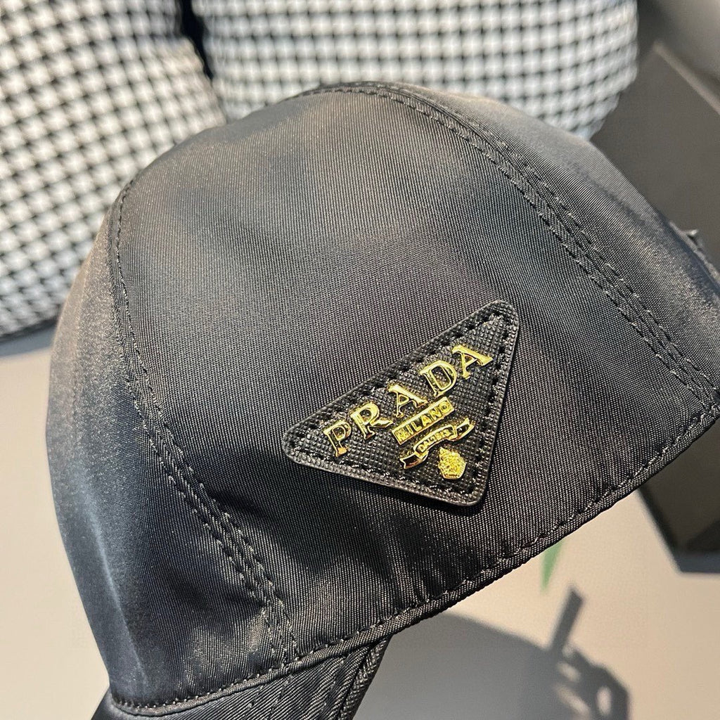 Black satin baseball cap with embroidered PRADA logo patch