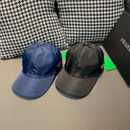 Blue and black satin baseball caps with PRADA logo patches
