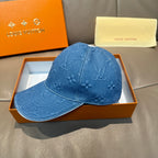Blue denim baseball cap with monogram embossing, curved brim in display box