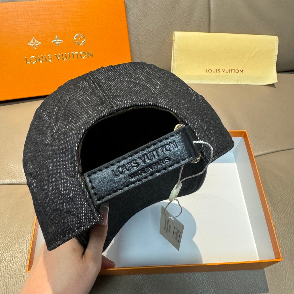 Black denim baseball cap with interior logo patch on adjustable band