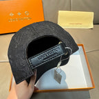 Black denim baseball cap with interior logo patch on adjustable band