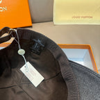Black denim baseball cap interior with adjustable strap and hanging tag