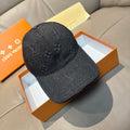 Black denim baseball cap with allover monogram pattern and curved brim