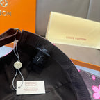Louis Vuitton cap interior with adjustable strap and hanging tag
