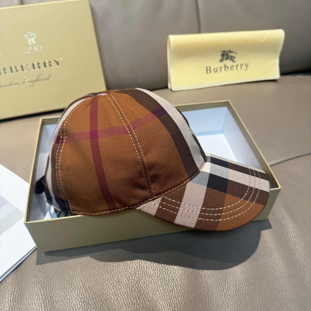 Plaid baseball cap with brown crown and visor, shown on a box.