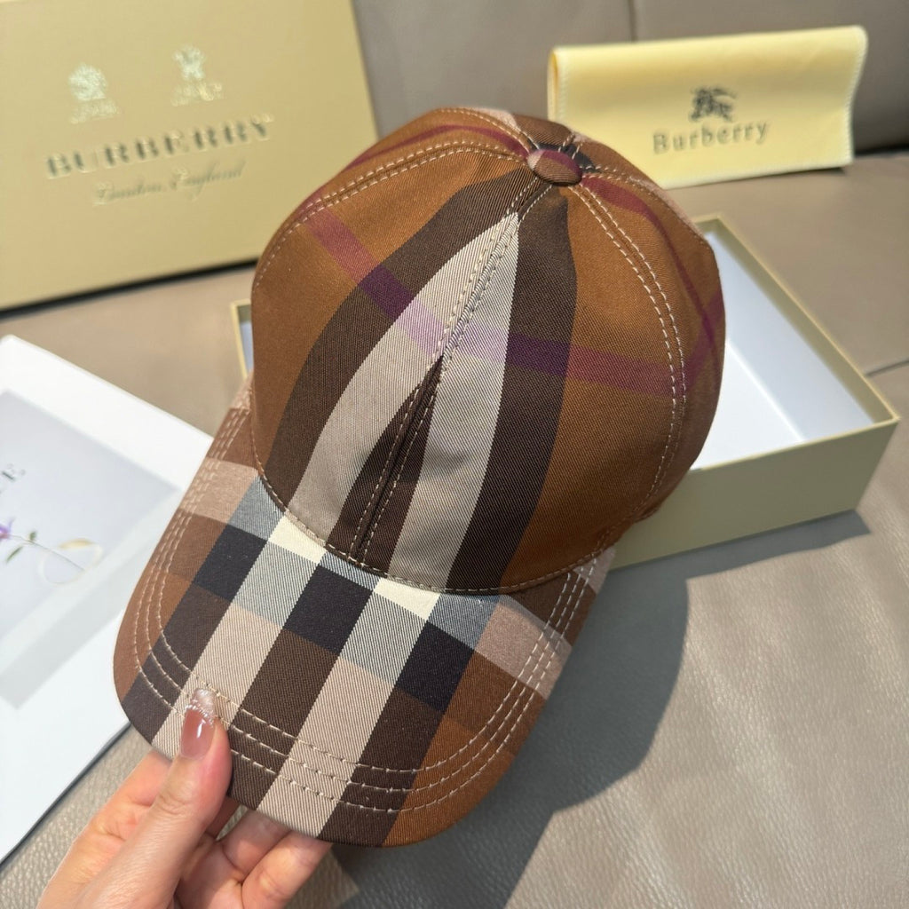 Brown plaid baseball cap, front view with top button and stitched panel.