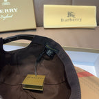 Black fabric interior strap and closure on baseball cap, with small hanging label