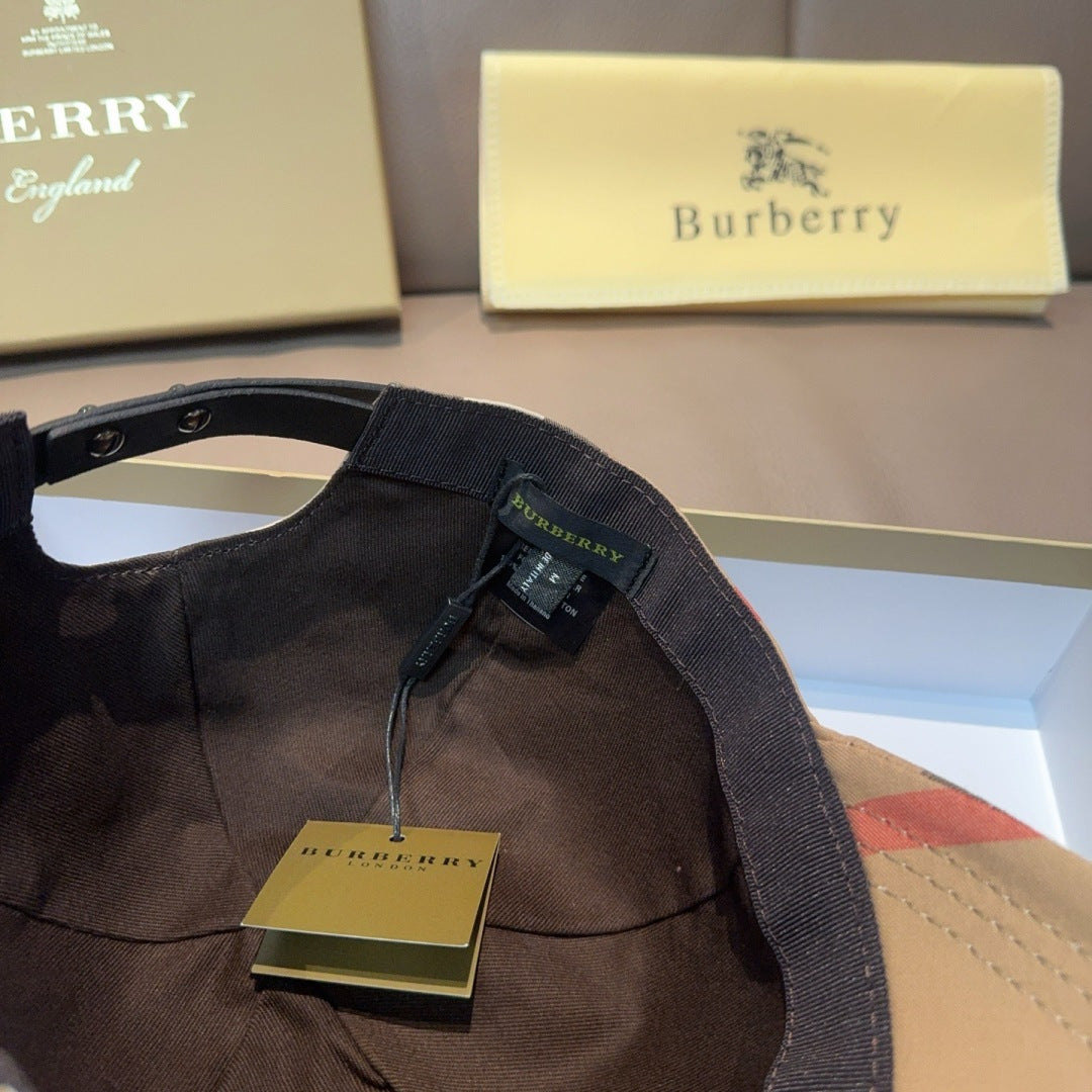 Black fabric interior strap and closure on baseball cap, with small hanging label