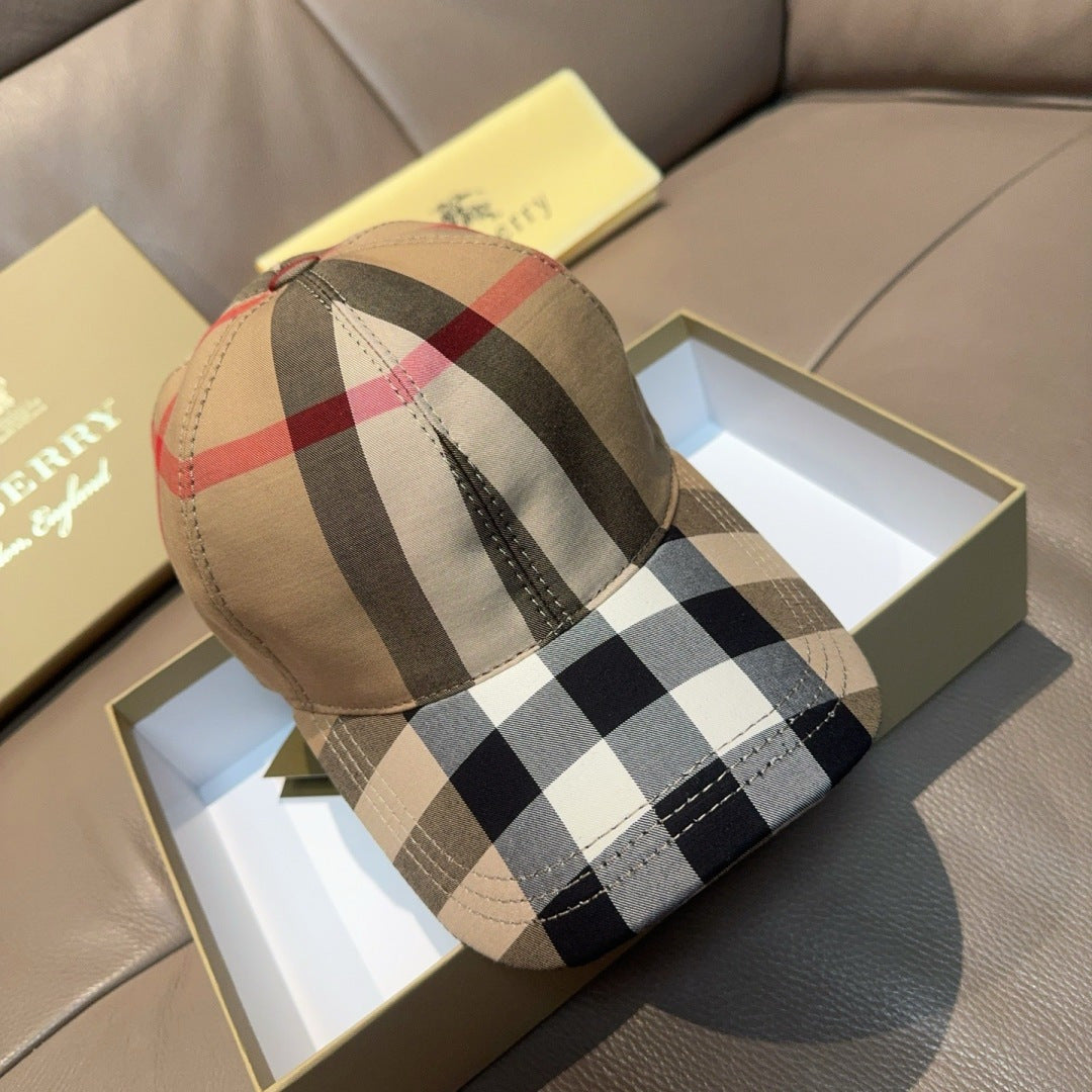 Plaid baseball cap angled view with beige top and red, black, and white check panels