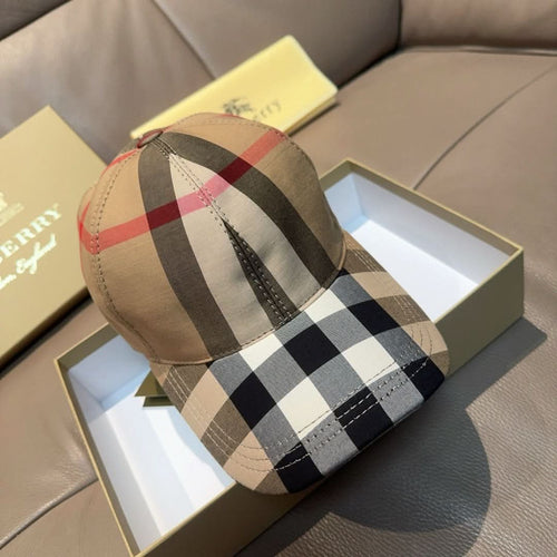 Plaid baseball cap angled view with beige top and red, black, and white check panels