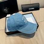 Denim baseball cap with CHANEL logo, light blue, curved brim, top button