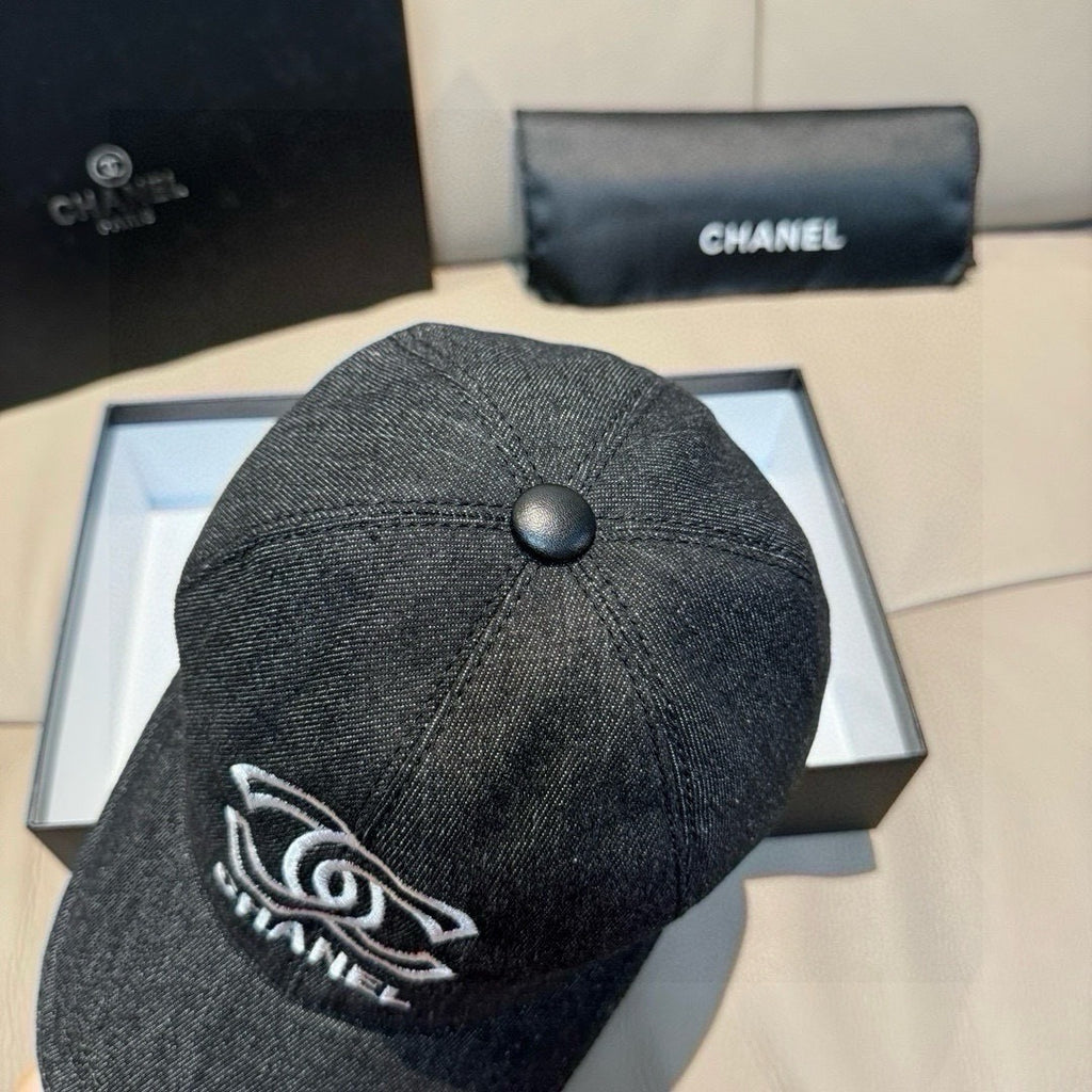 Dark charcoal denim baseball cap, side view with white embroidered logo