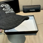 Dark charcoal denim baseball cap, curved brim close-up on front panel