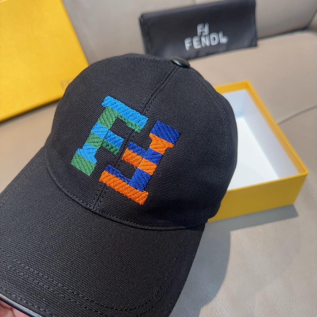 Fendi cap close-up of dark fabric crown with multicolor embroidered logo