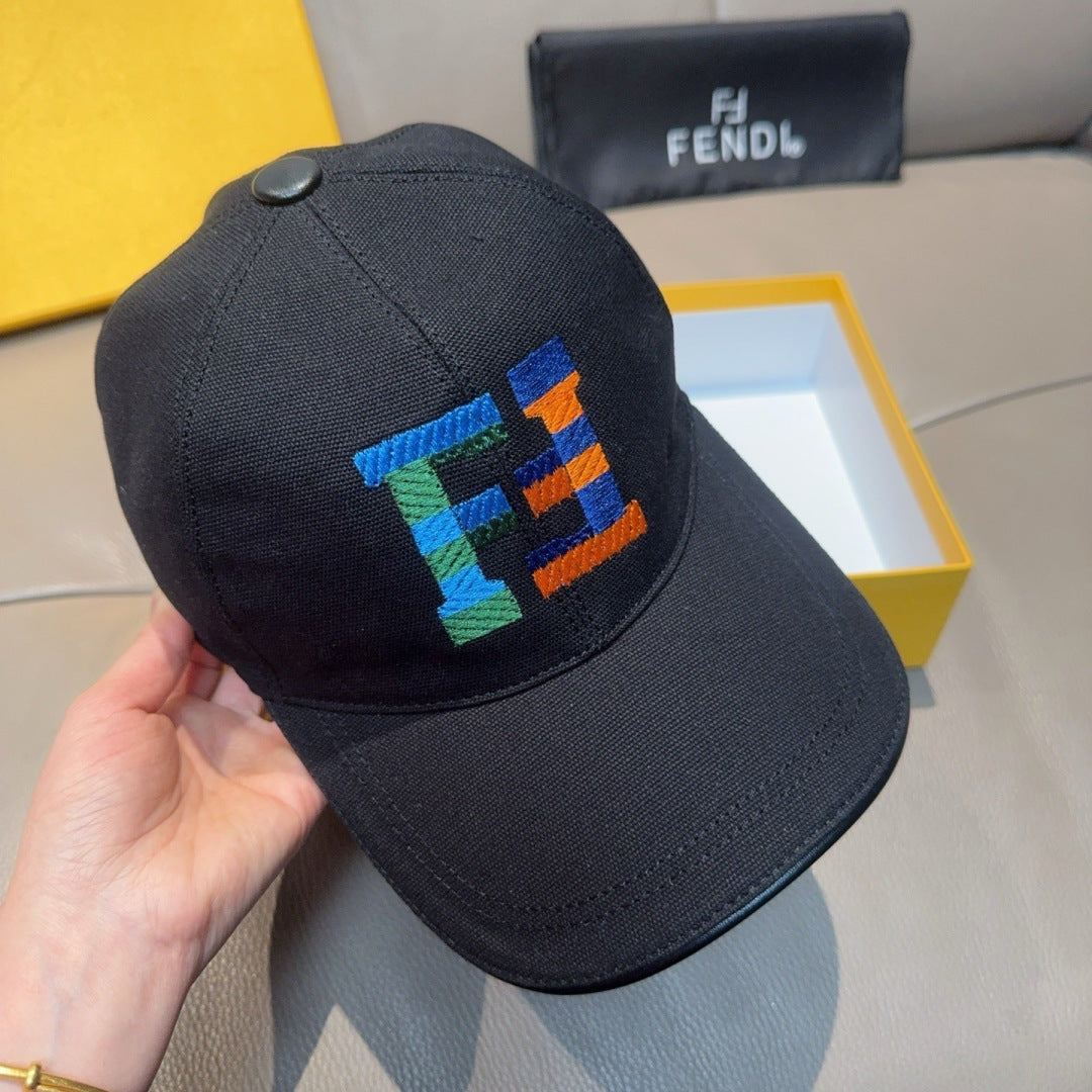 Fendi cap shown from side with multicolor embroidered logo patch on front