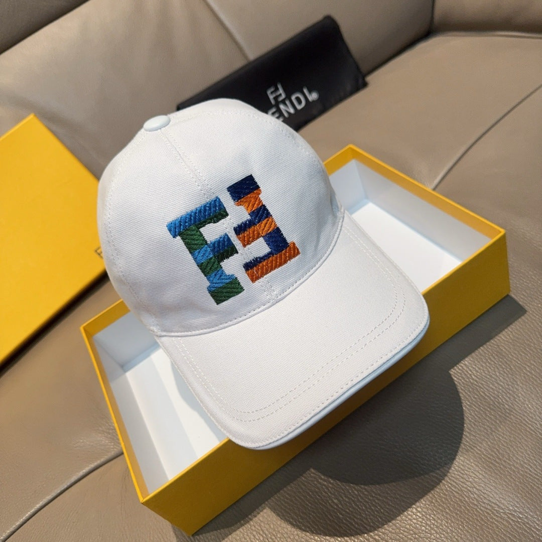 White cap with multicolor FENDI patch logo on the front panel