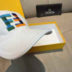 White cap brim with multicolor FENDI patch logo, close-up