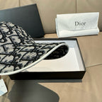 Dior cap showing patterned side panel and curved brim
