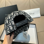 Dior baseball cap side view with dark adjustable strap and metal buckle