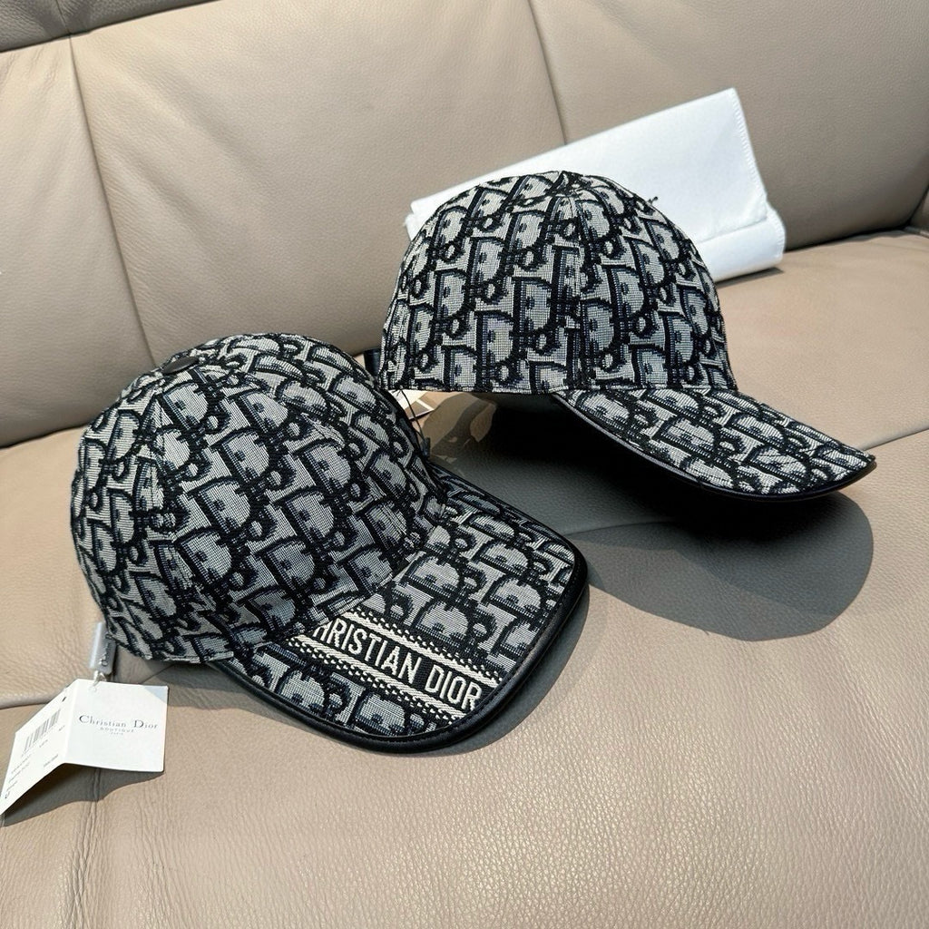 Pair of Dior baseball caps with black-and-white logo monogram pattern