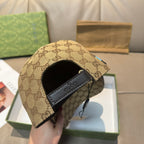 Gucci cap interior side view with GG monogram and black leather strap