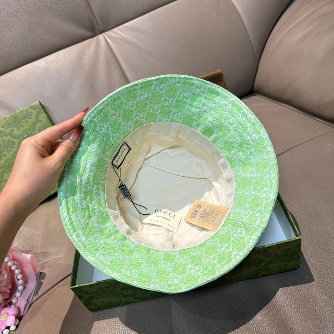 Gucci green monogram bucket hat interior view with cream lining