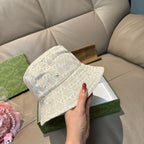 Gucci bucket hat beige/cream with GG monogram, side view with curved brim