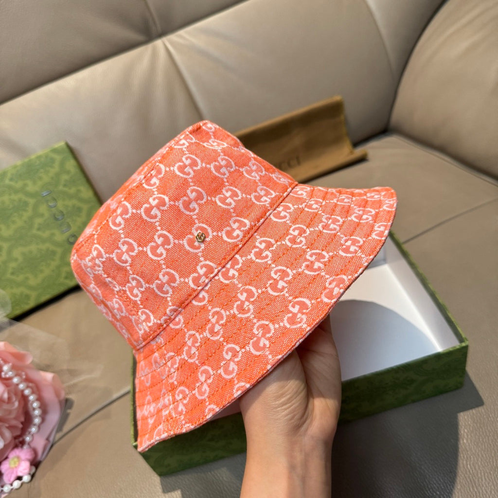 Gucci orange GG monogram bucket hat with folded brim detail