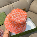 Gucci orange GG monogram bucket hat, back and side view