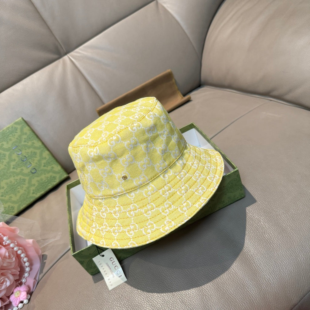 Gucci yellow monogram bucket hat with stitched brim and stitched panels
