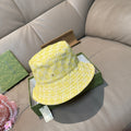 Gucci yellow monogram bucket hat with stitched brim and stitched panels