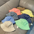 Gucci patterned bucket hat set in multiple colors (orange, yellow, blue, green)