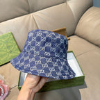 Gucci bucket hat in blue GG monogram denim, angled front view