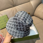 Gucci bucket cap with dark gray GG monogram print, back view