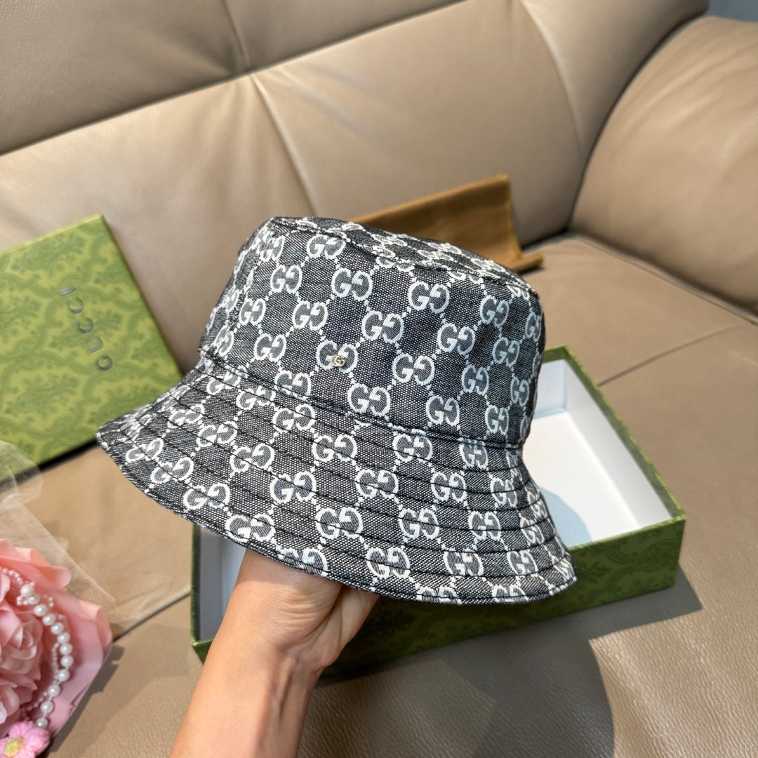 Gucci bucket cap with dark gray GG monogram print, side view