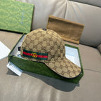 Gucci baseball cap in beige GG canvas with multicolor stripe and curved brim.