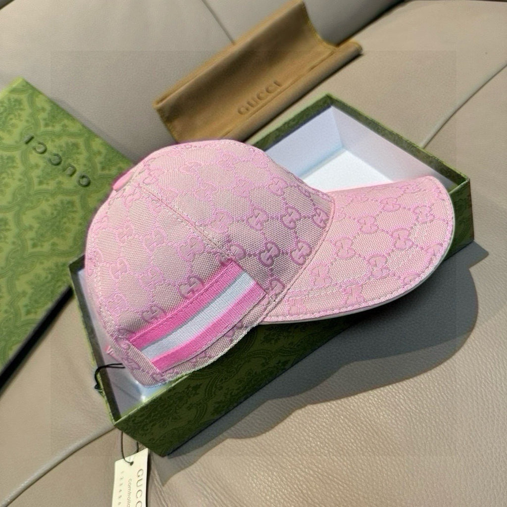 Gucci pink GG jacquard cap showing front striped web detail and side stitching.