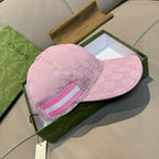 Gucci pink GG jacquard cap showing front striped web detail and side stitching.
