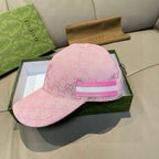 Gucci pink GG jacquard cap with pink brim and striped front band.