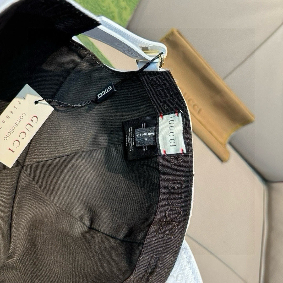 Gucci black GG monogram baseball cap with red-green Web stripe, front close-up