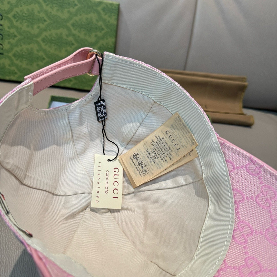 Pink monogram baseball cap interior view with trim and hanging label tags